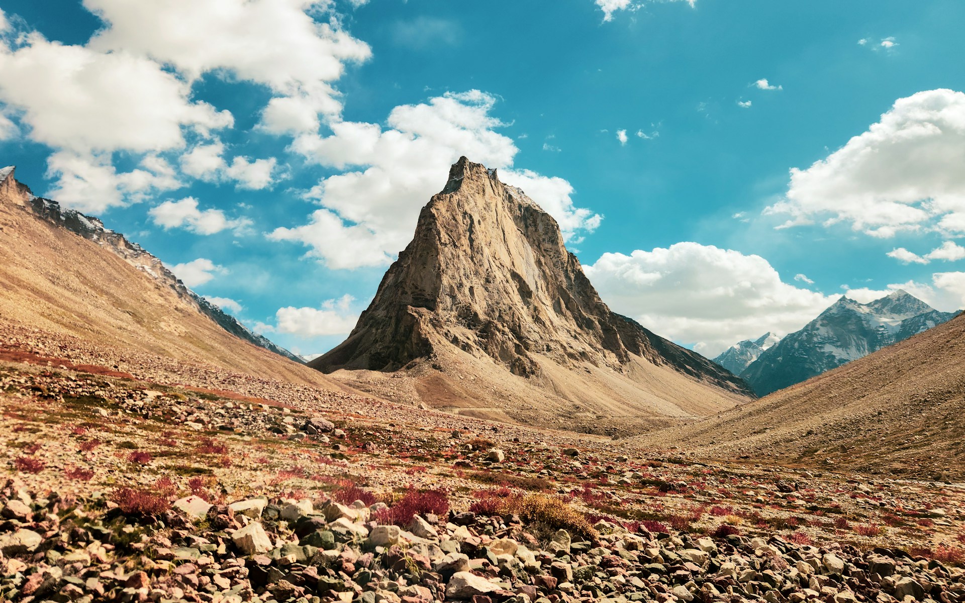 A bare, rocky mountain peak with nothing growing on it